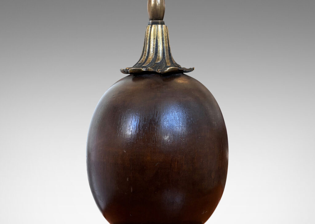 Gallery BAC egg form on foliate mounts and disk base; brass and mahogany