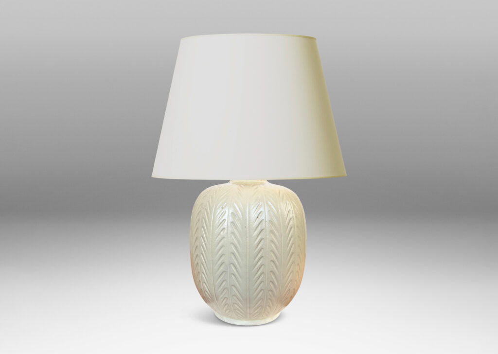 Gallery BAC ovoid form with carved foliate-like meridians, glazed in eggshell finish ivory