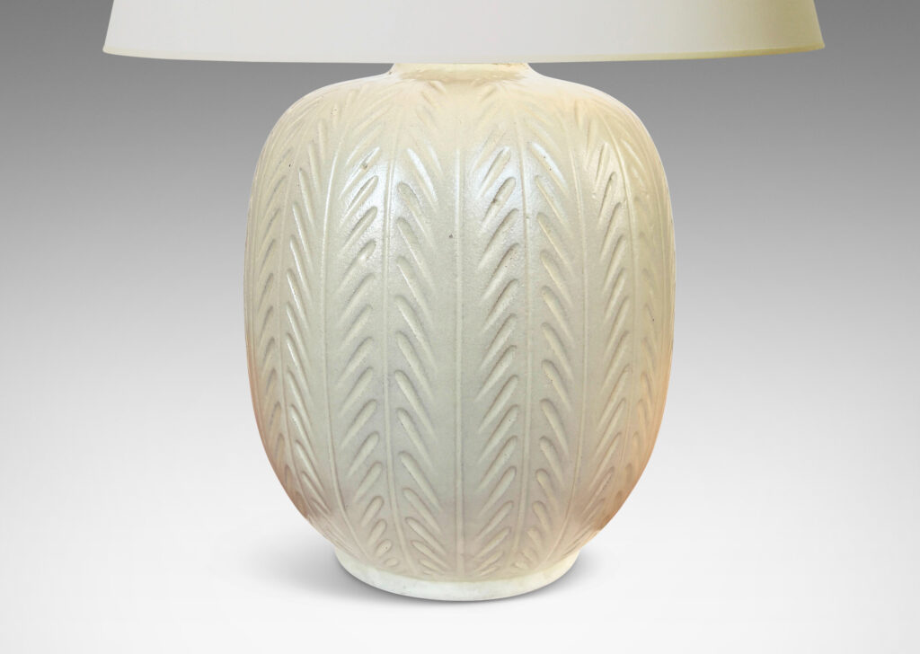 Gallery BAC ovoid form with carved foliate-like meridians, glazed in eggshell finish ivory