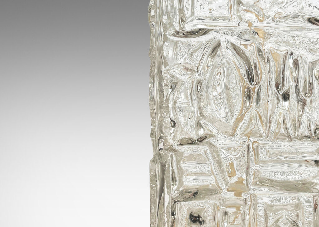 Gallery BAC square canister forms with various geometric designs in reliefs; clear mold-blown glass