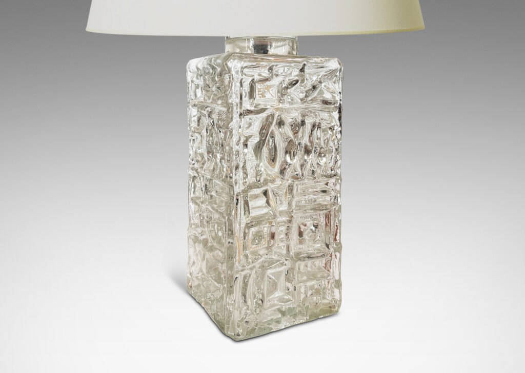 Gallery BAC square canister forms with various geometric designs in reliefs; clear mold-blown glass