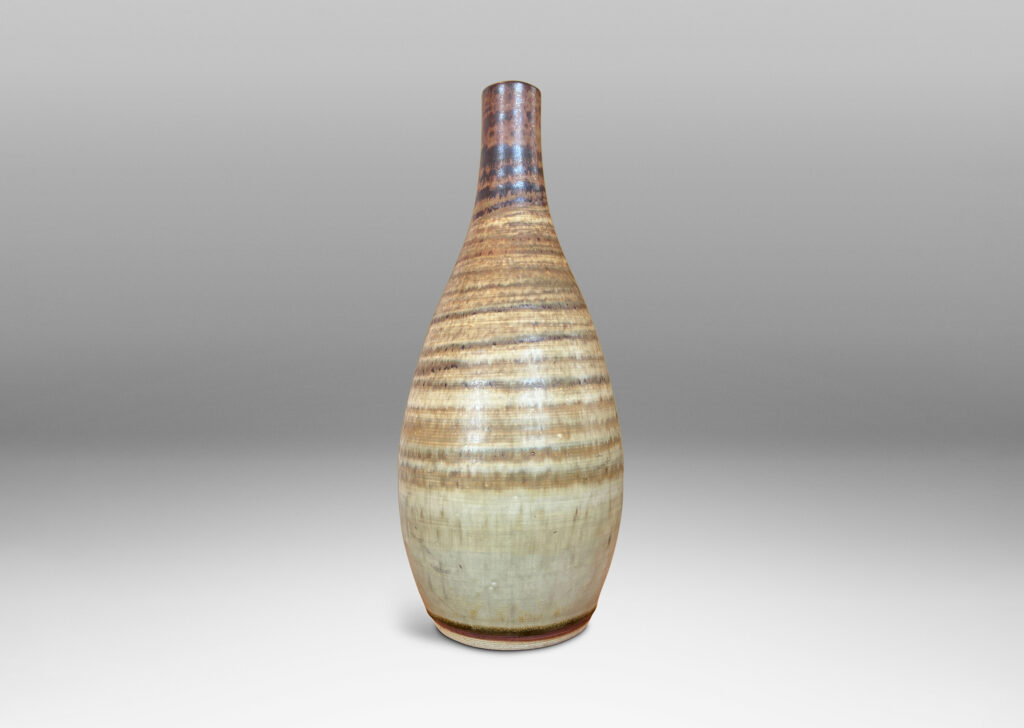 Gallery BAC swelling form with elongated neck, glazed in spiraling green-brown tones