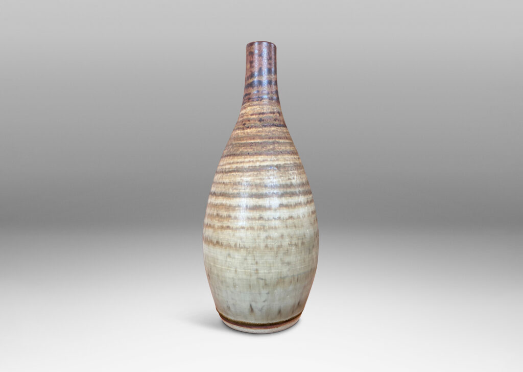 Gallery BAC swelling form with elongated neck, glazed in spiraling green-brown tones