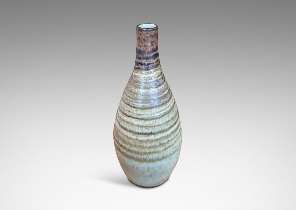 Gallery BAC swelling form with elongated neck, glazed in spiraling green-brown tones