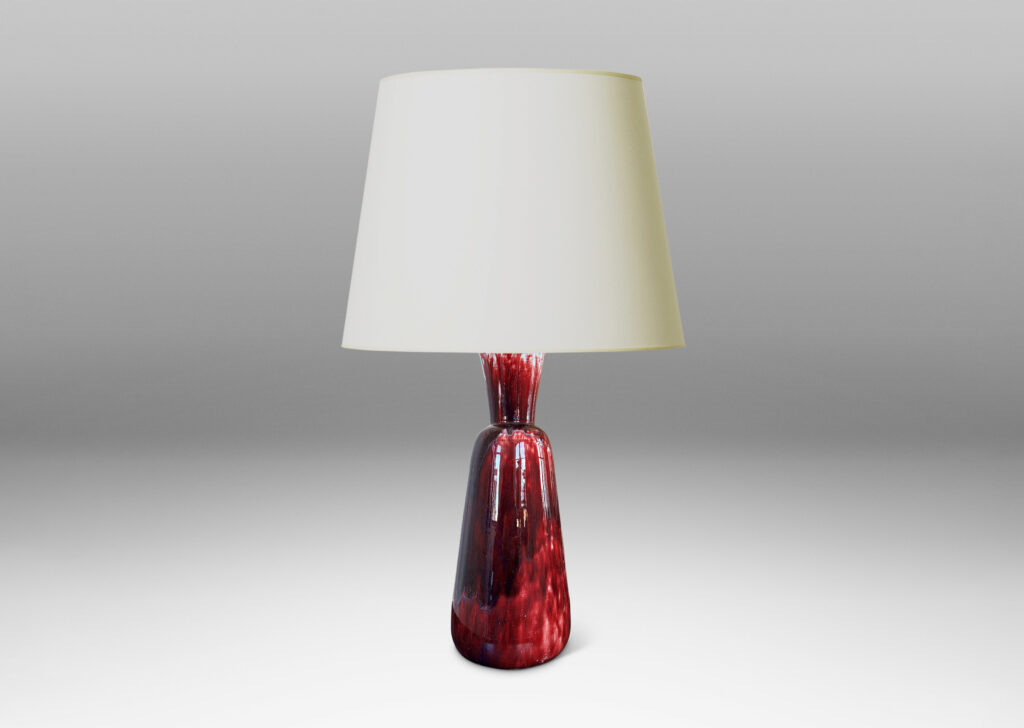 Gallery BAC tall flared form with trumpet mouth, glazed in a flowing oxblood with pale gray accents