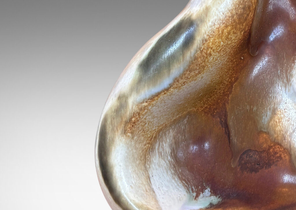 Gallery BAC organically modeled forms, glazed in white and light brown