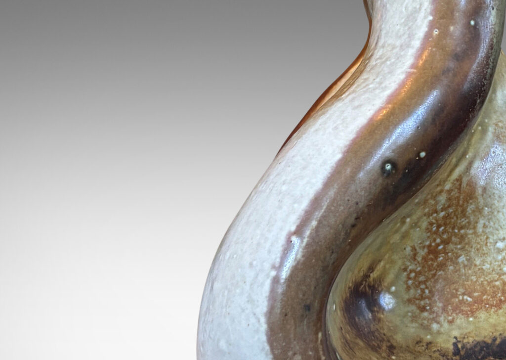 Gallery BAC organically modeled forms, glazed in white and light brown