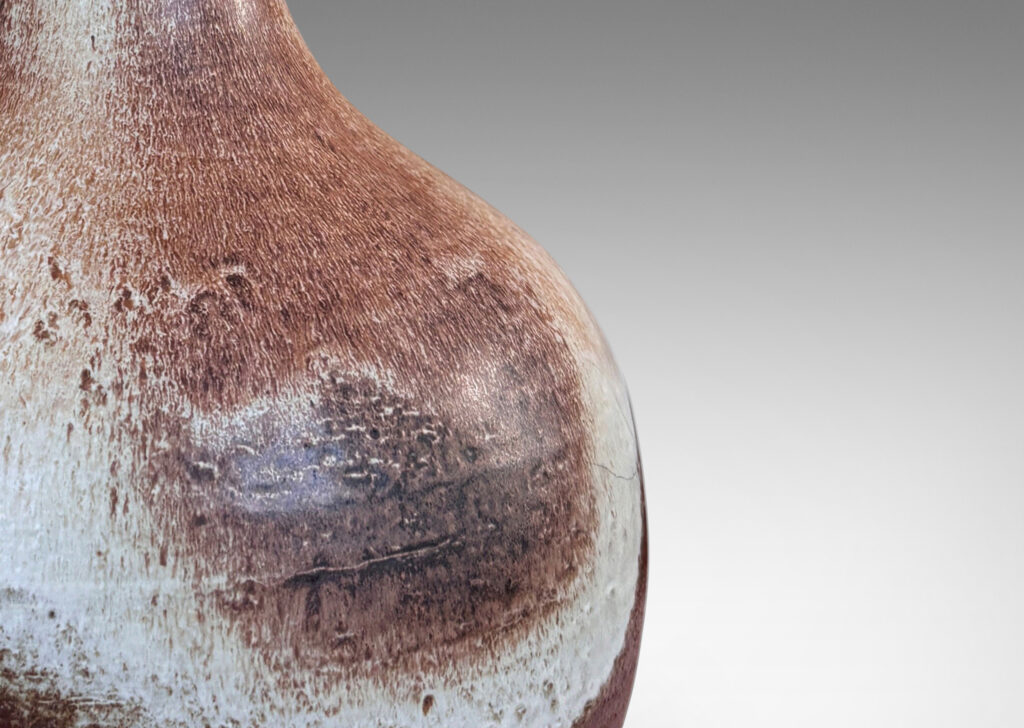 Gallery BAC voluptuous decanter form, glazed in brown with ivory