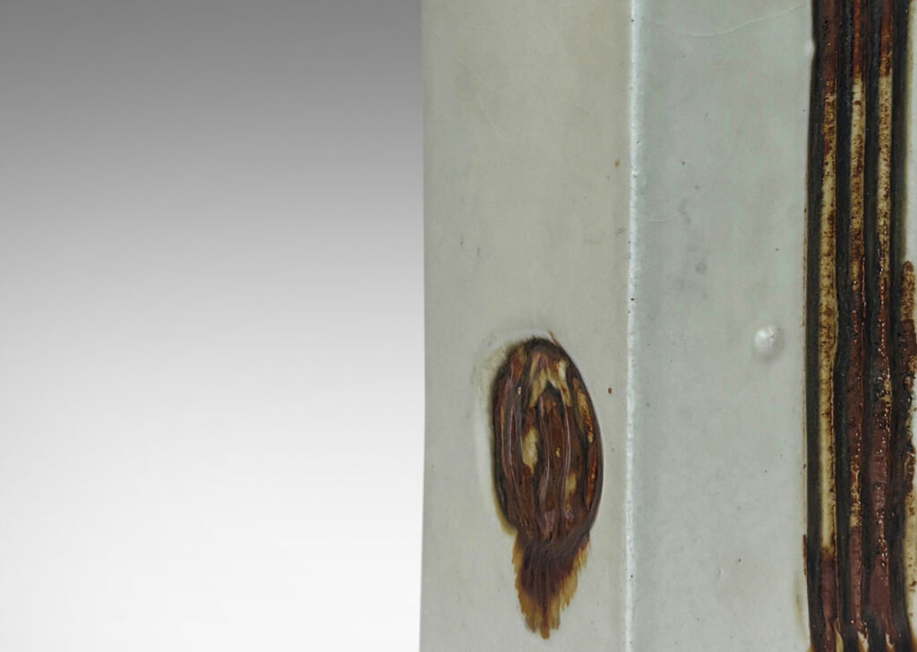 Gallery BAC rectangular box form, with linear and circular motifs, glazed in pale gray with brown