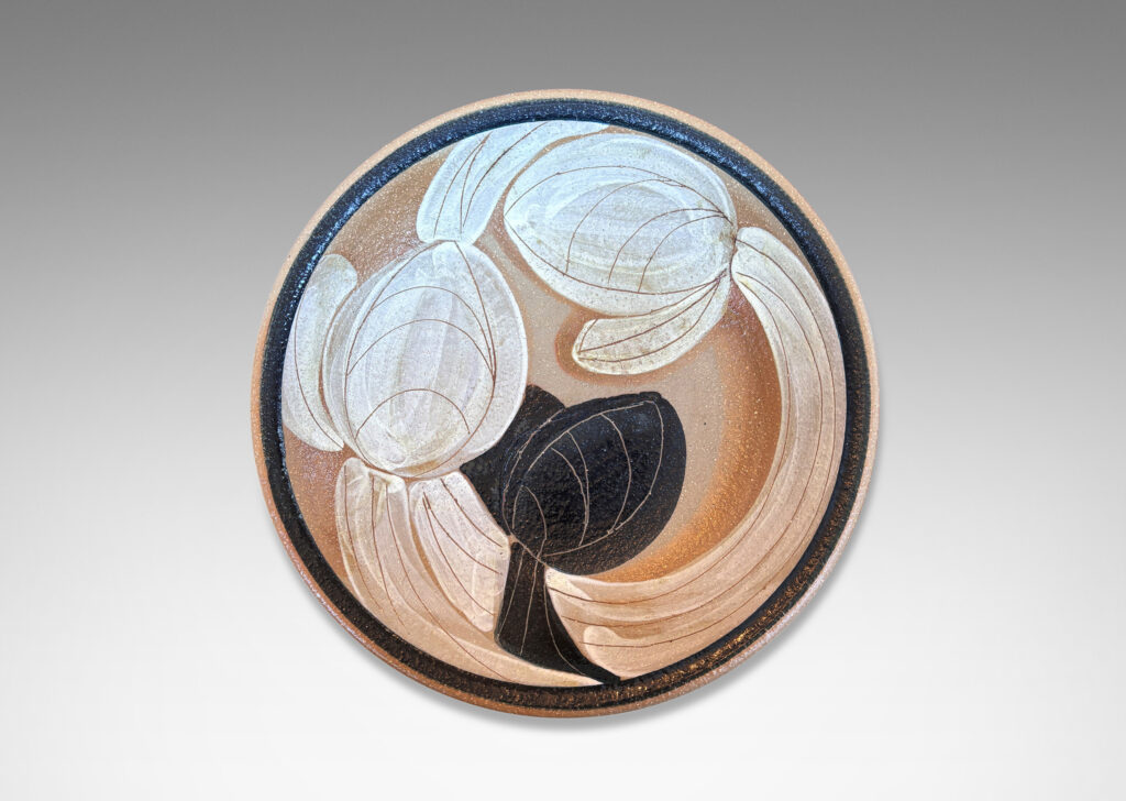 Gallery BAC concave form partially glazed with abstracted foliate design in black, ivory and brown