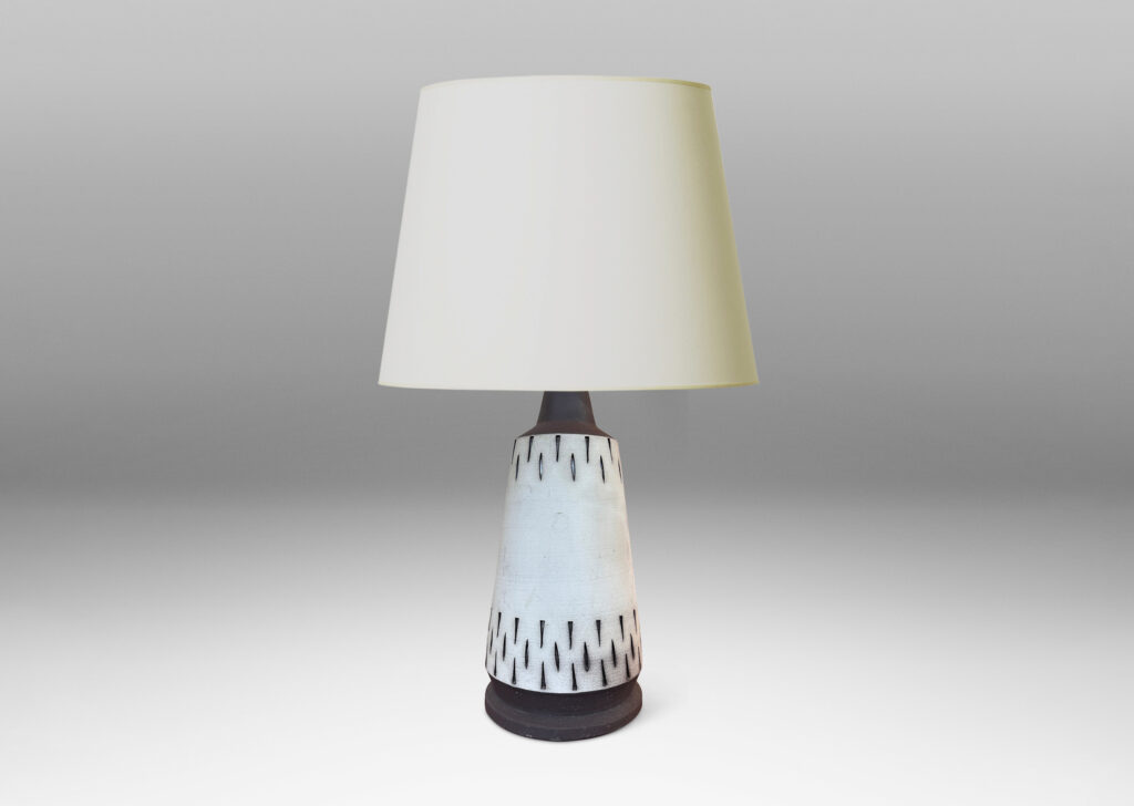 Gallery BAC raked form with carved geometric ornaments, glazed in matte pale taupe and brown