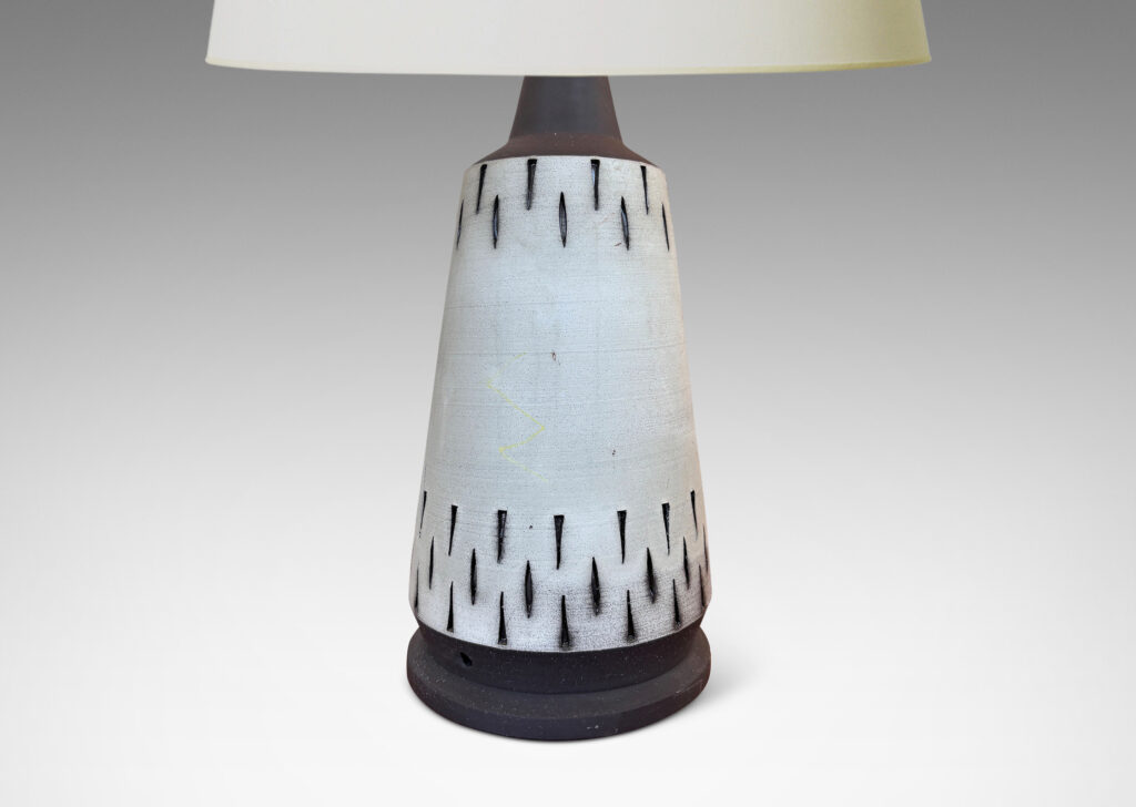 Gallery BAC raked form with carved geometric ornaments, glazed in matte pale taupe and brown
