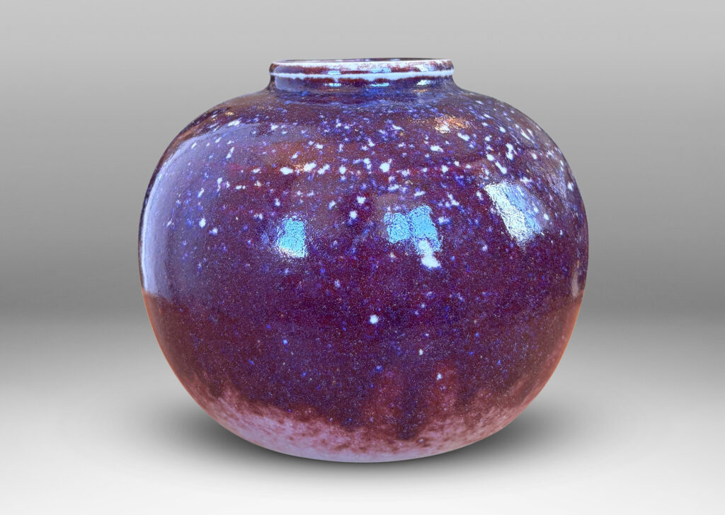 Gallery BAC plump bun form glazed in a violet-burgundy oxblood with pale gray accents