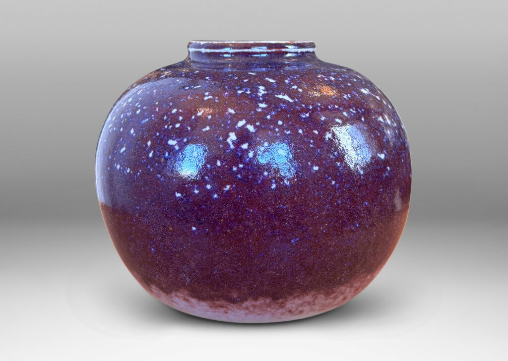 Gallery BAC plump bun form glazed in a violet-burgundy oxblood with pale gray accents
