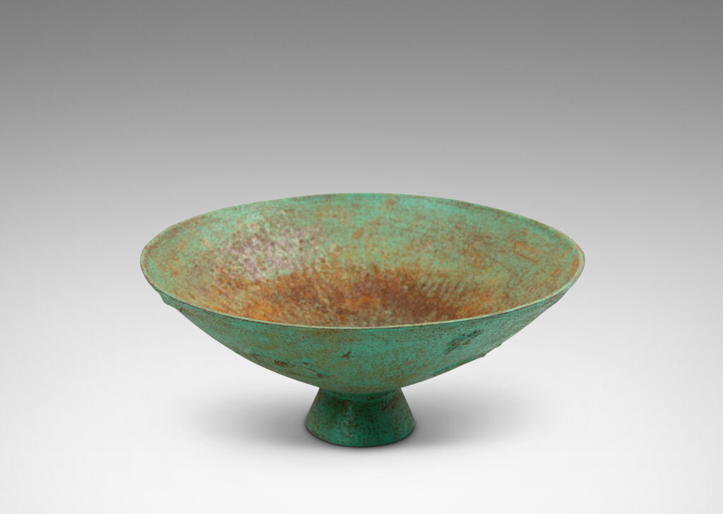 Gallery BAC wide angled forms on a flared stand, with reliefs of flora, birds and celestial bodies, painted in a rare original verdigris-turquoise
