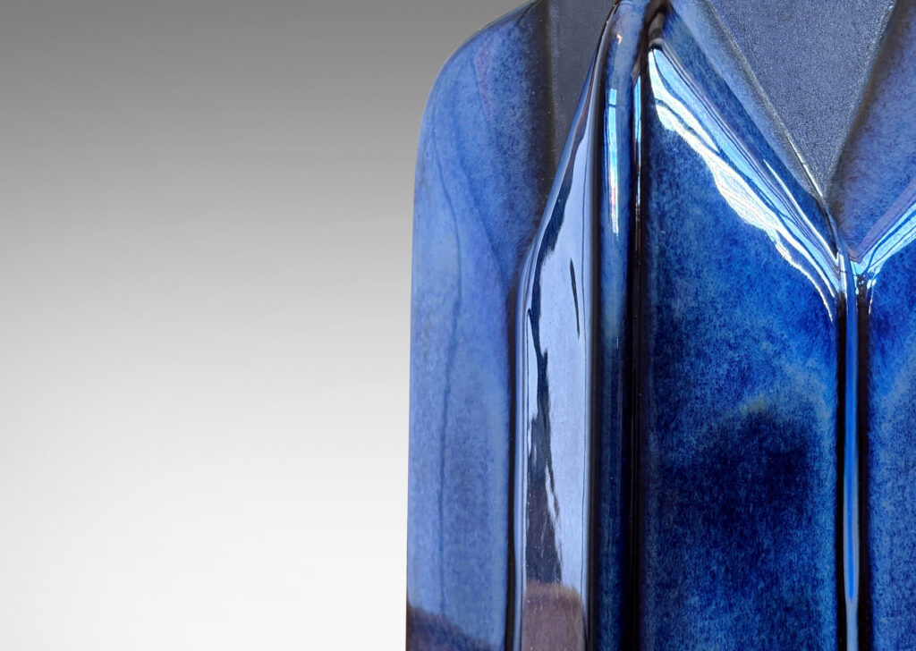 Gallery BAC skyscraper-like tiered form glazed in blue luster and matte brown