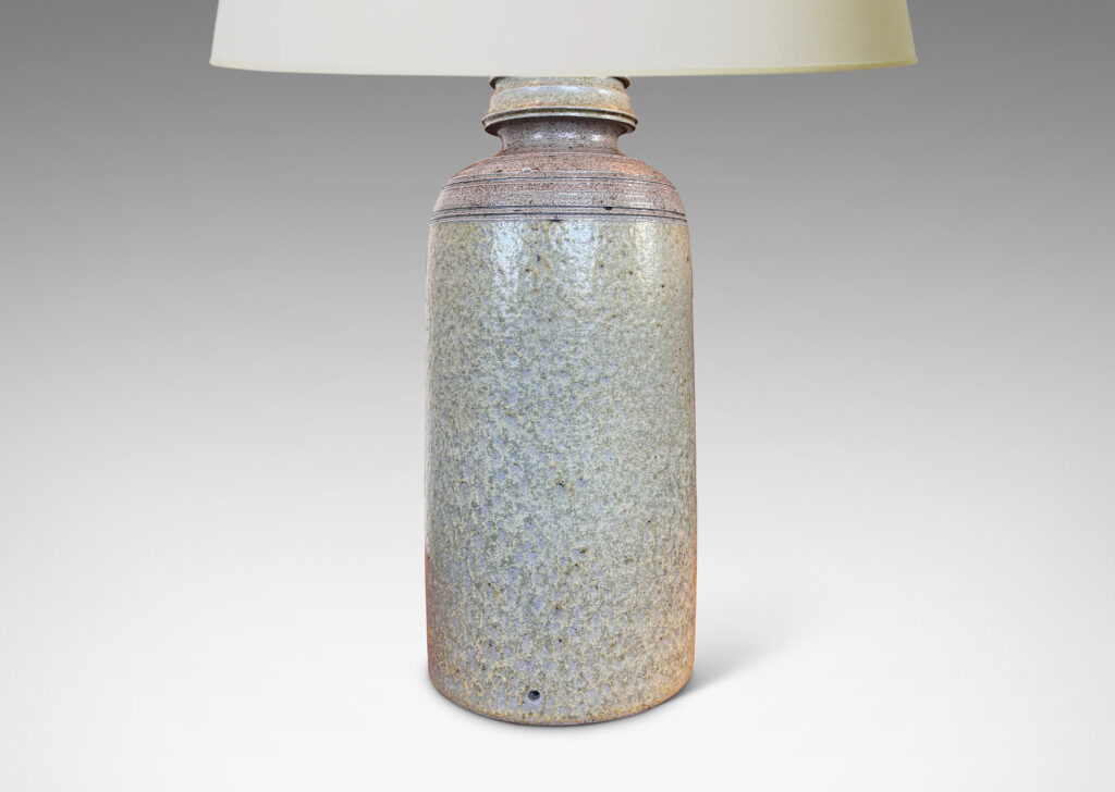 Gallery BAC columnar form with sculpted top, glazed in a light gray with brown dappling