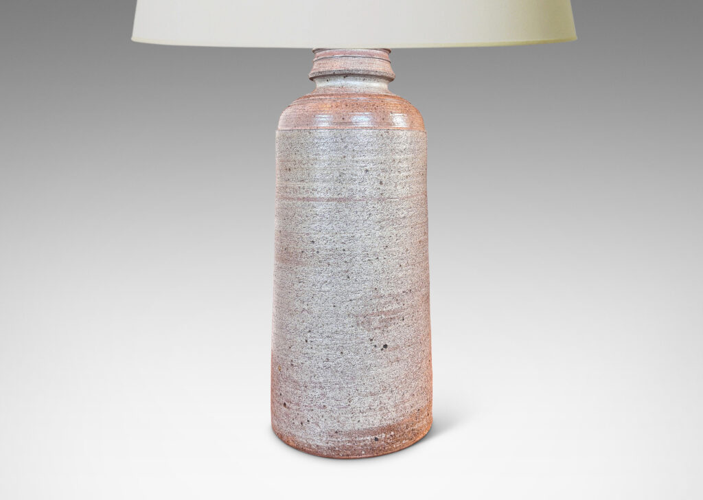 Gallery BAC columnar form with sculpted top, glazed in a light gray with dappling