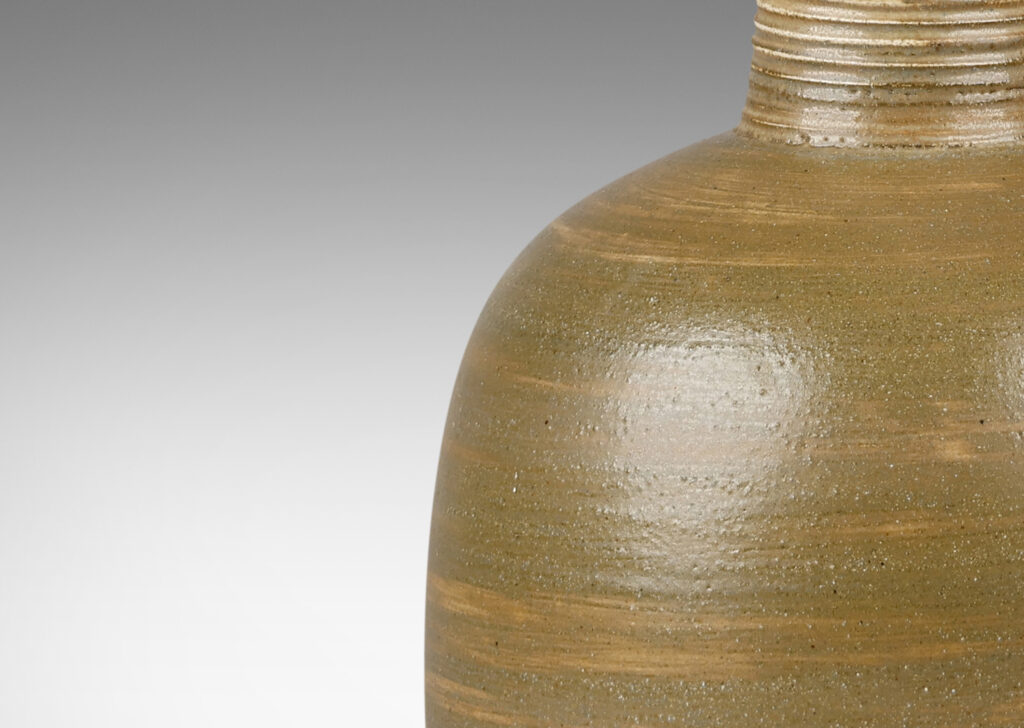 Gallery BAC stout ovoid form glazed in a green0sh brown raw umber