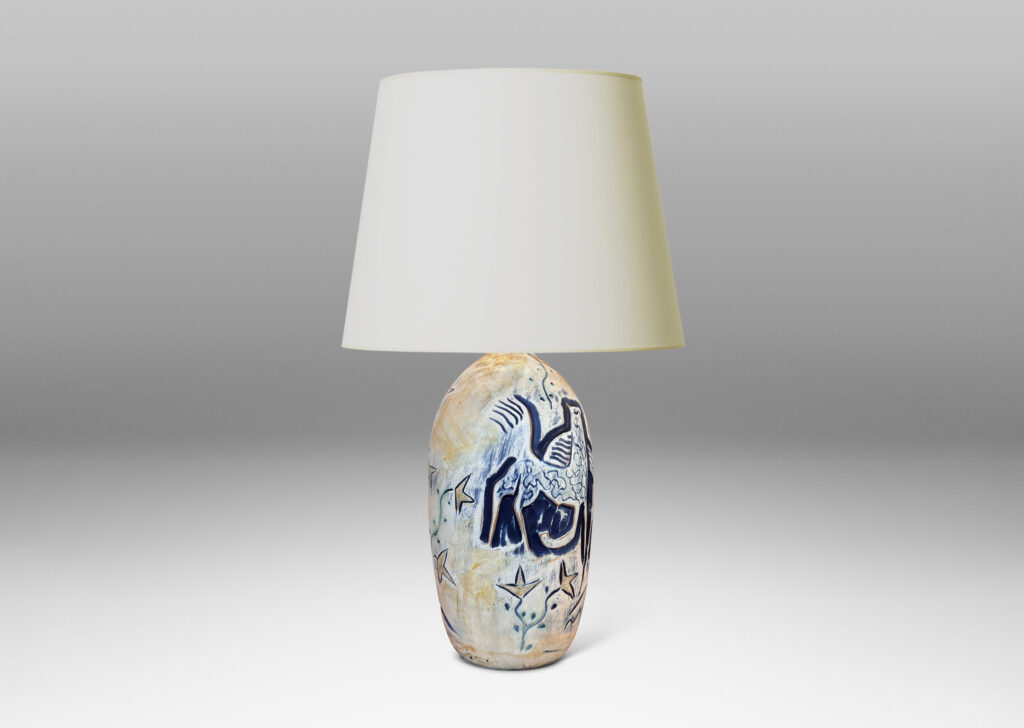 Gallery BAC elongated ovoid form with wonderful carved stylized horses and foliage, glazed in matte blues and yellows