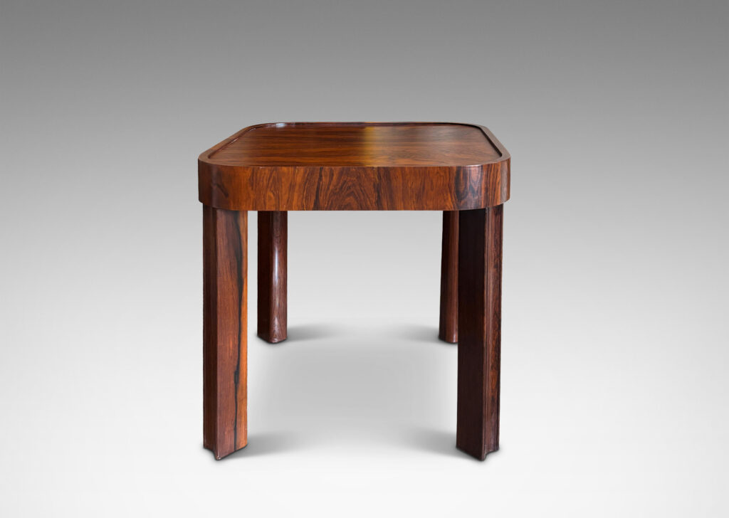 Gallery BAC square top with book-matched veneers and rounded corners, on diagonally set legs with coved faces