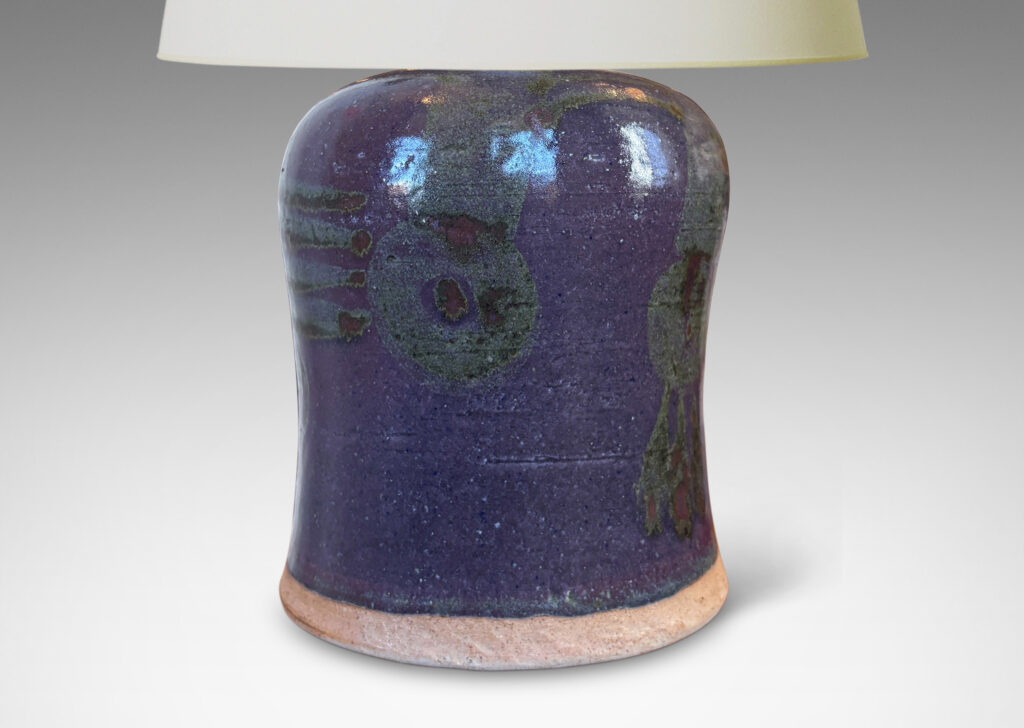 Gallery BAC substantial bell form glazed in burgundy oxblood with tassel design in gray-purple