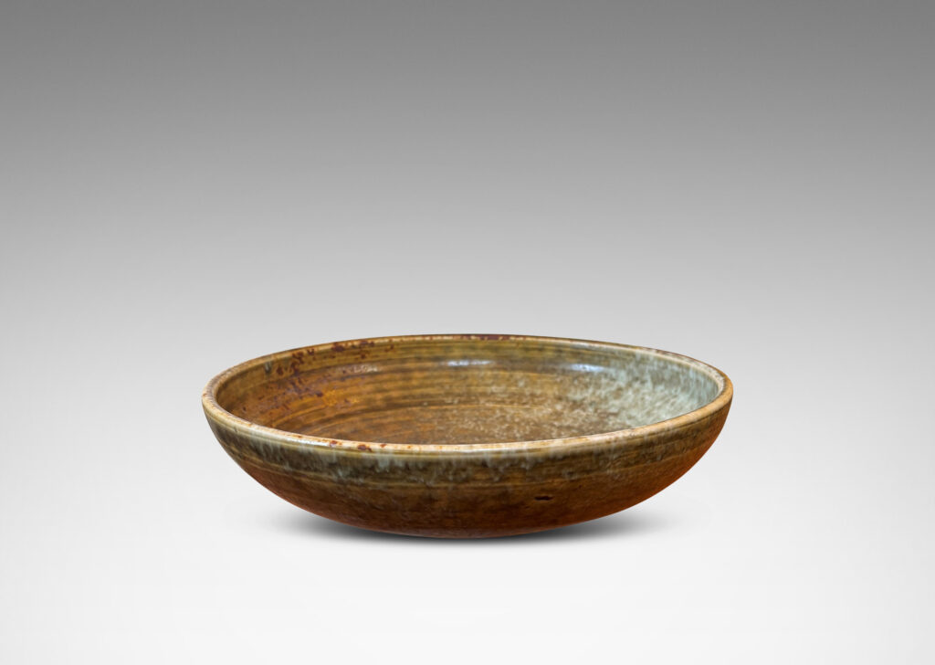 Gallery BAC gently arced form glazed in olive, tan and light blue, stoneware