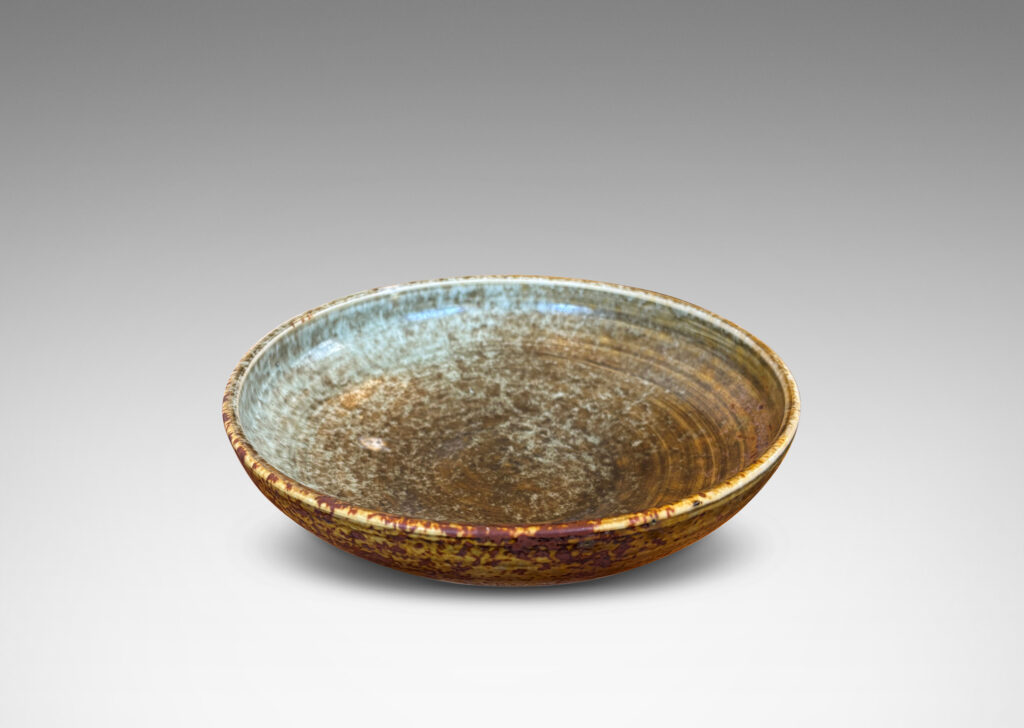 Gallery BAC gently arced form glazed in olive, tan and light blue, stoneware