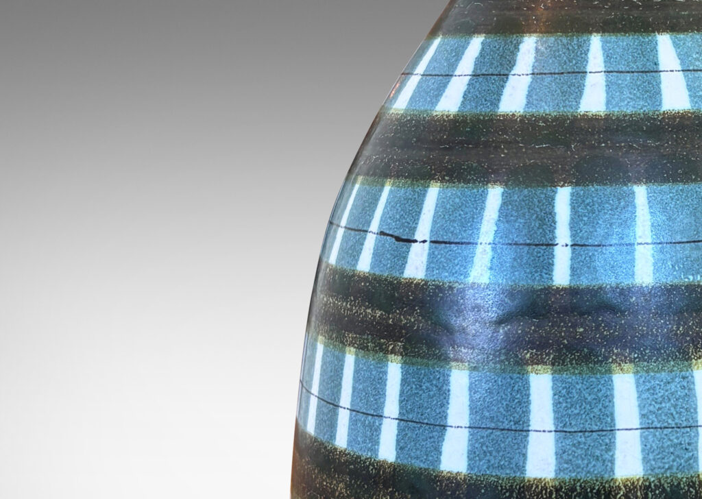 Gallery BAC attenuated bell form glazed in white with olive-brown bands and dark green stripes