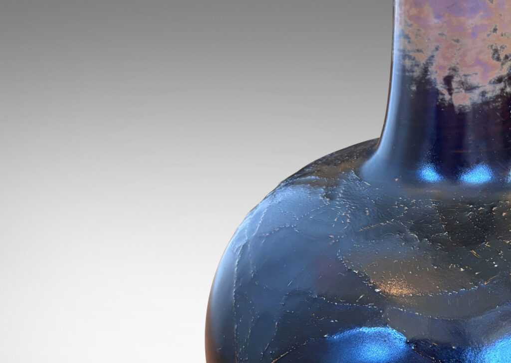 Gallery BAC gourd form with plump globe and attenuated neck, with textile texture draping around shoulder, glazed in black with red luster