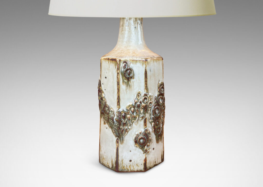 Gallery BAC octagonally faced form with applied abstracted garland reliefs, glazed in pale taupe with brown