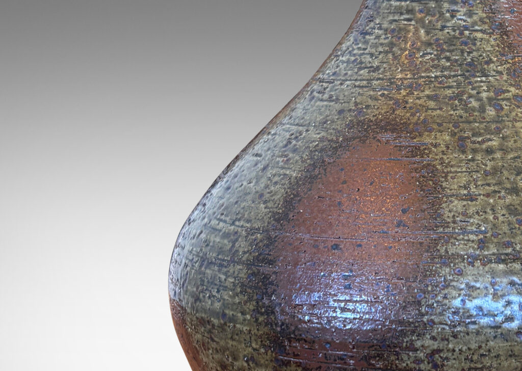 Gallery BAC decanter-like form, glazed in a greenish gray with abstract brown luster design