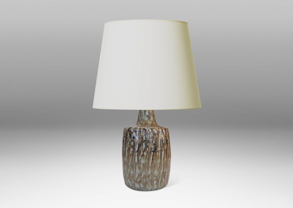 Gallery BAC swelling column forms with rustic texture and flowing brown glaze