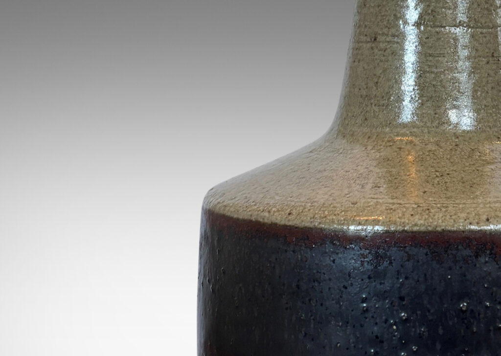 Gallery BAC floating drum form with reveal and conical neck, glazed in light gray and gunmetal gray-red luster