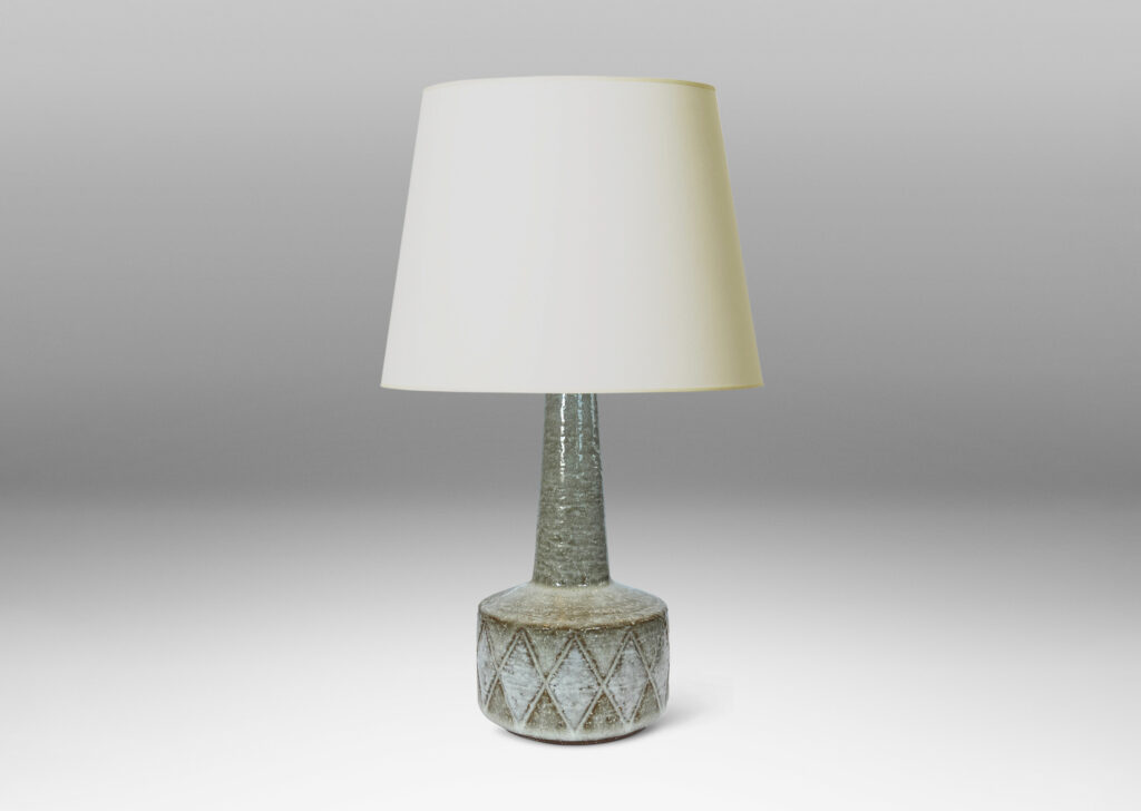 Gallery BAC drum form encircled with carved diamonds and tall conical neck, glazed in pale taupe and white