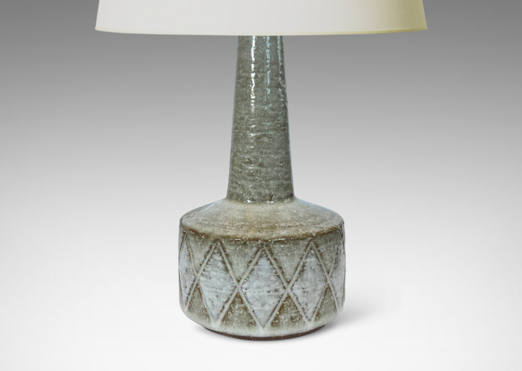 Gallery BAC drum form encircled with carved diamonds and tall conical neck, glazed in pale taupe and white