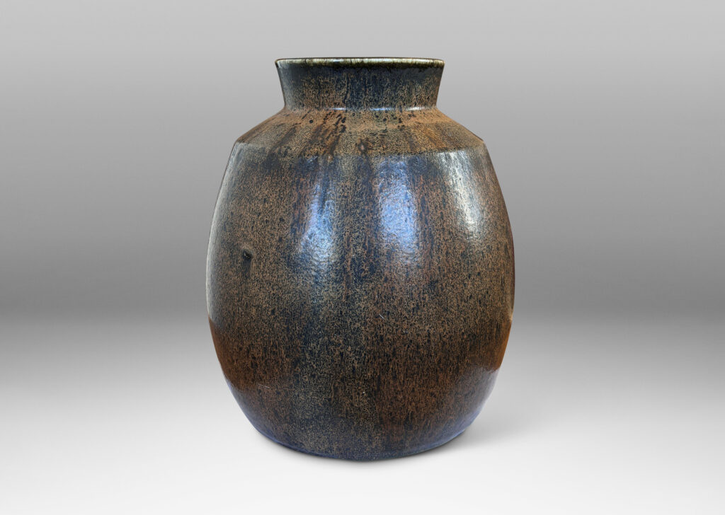 Gallery BAC ovoid form with wide flared mouth, glazed in flowing black and brown
