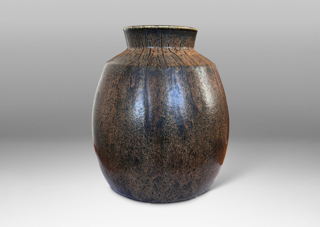 Gallery BAC ovoid form with wide flared mouth, glazed in flowing black and brown