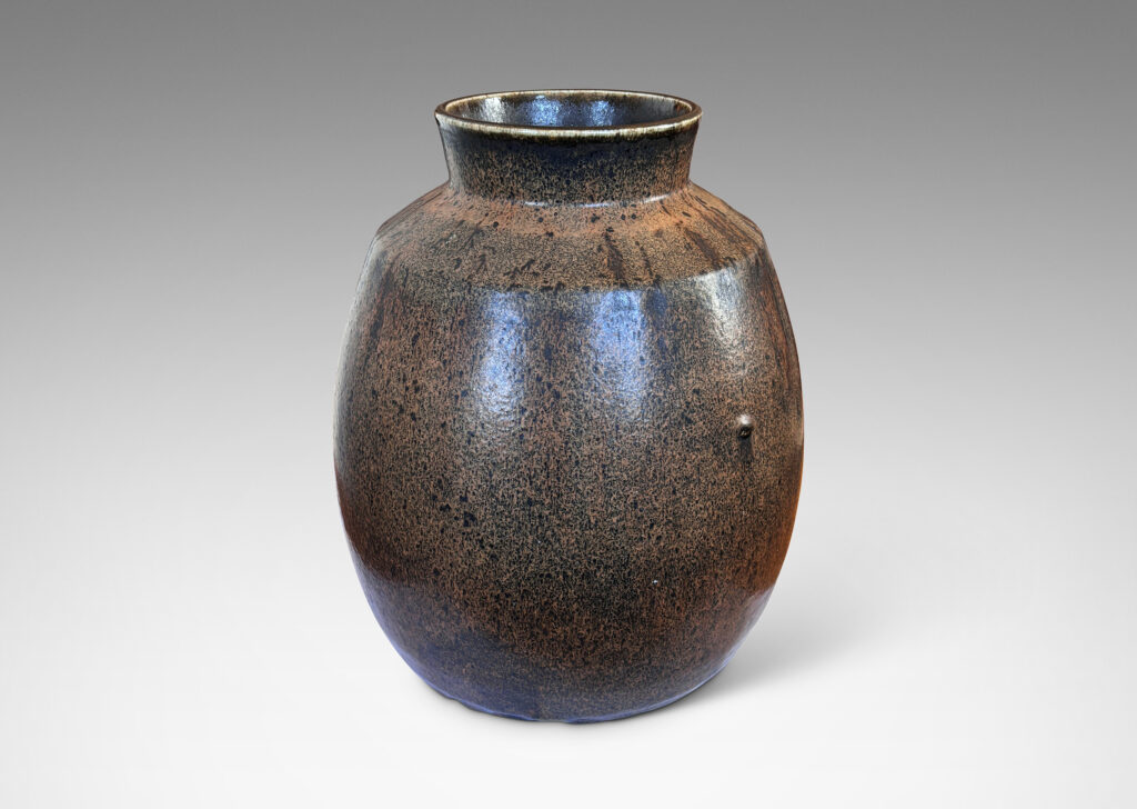 Gallery BAC ovoid form with wide flared mouth, glazed in flowing black and brown