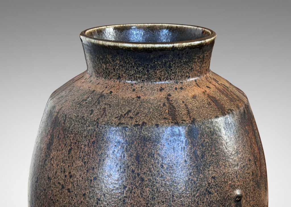 Gallery BAC ovoid form with wide flared mouth, glazed in flowing black and brown