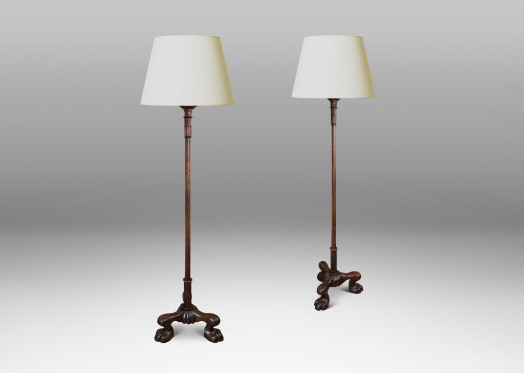 Gallery BAC tall stands with carved leafy capitals on top, and springing lions paw feet at base