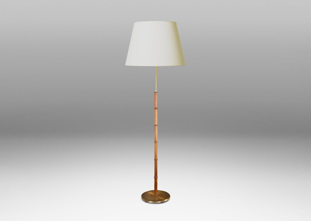 Gallery BAC stand with decorative bamboo node rings on a disk base; teak, brass and cast iron