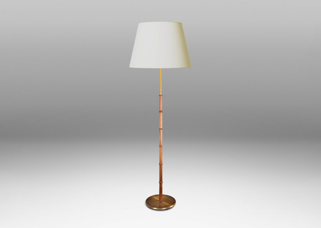 Gallery BAC stand with decorative bamboo node rings on a disk base; teak, brass and cast iron