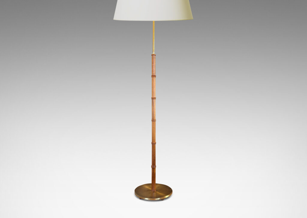 Gallery BAC stand with decorative bamboo node rings on a disk base; teak, brass and cast iron