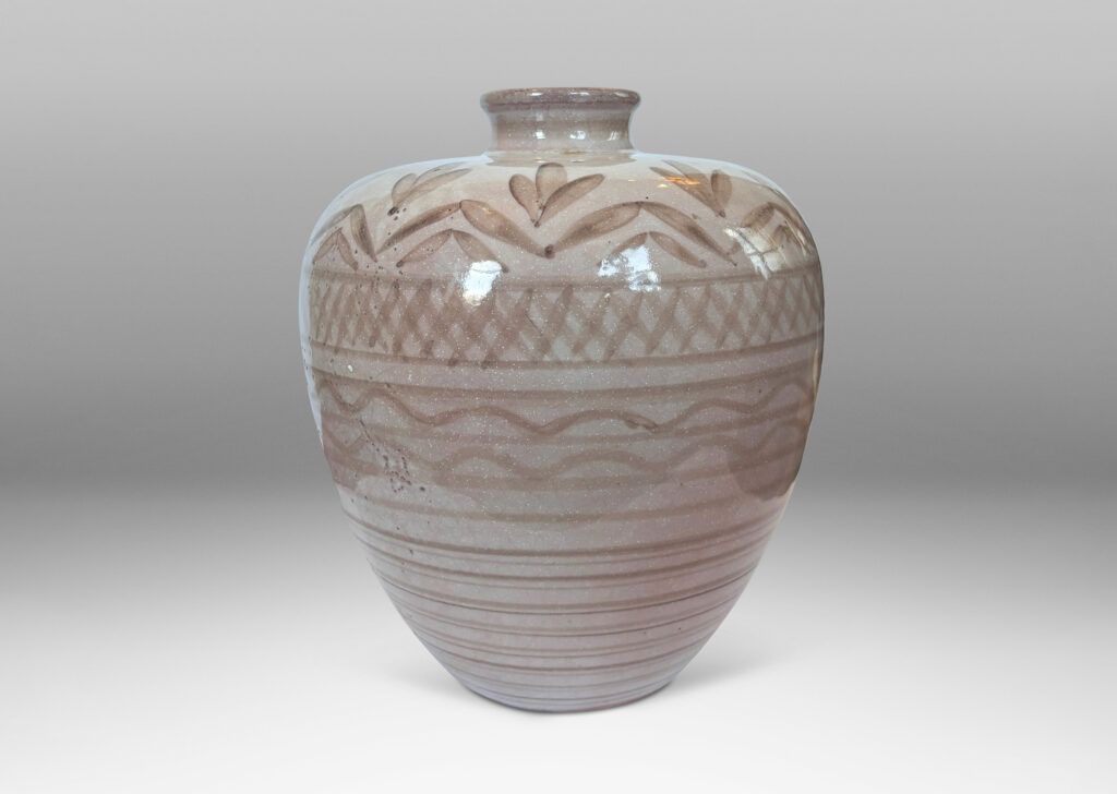 Gallery BAC tapered form and spout mouth, glazed in pale gray-lavender, with geometric decorations in gray