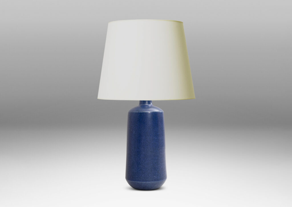 Gallery BAC cylindrical form with bell-like modeling, glazed in a deep blue color