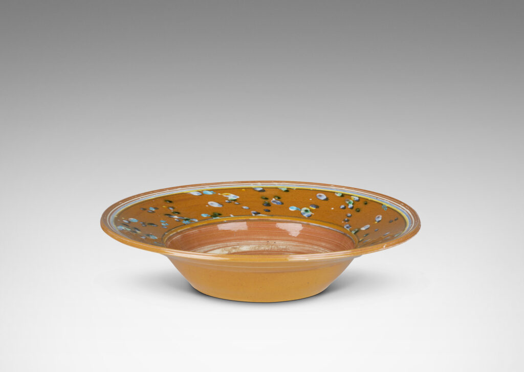 Gallery BAC glazed in caramel brown with stripes, drips and swirl in white, blue and yellow