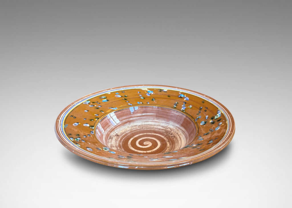 Gallery BAC glazed in caramel brown with stripes, drips and swirl in white, blue and yellow