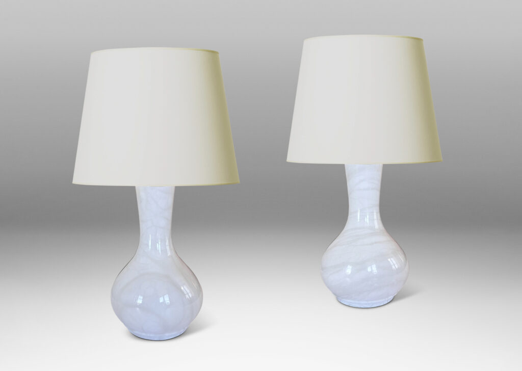 Gallery BAC vase-like forms in solid turned white marble with pale veining