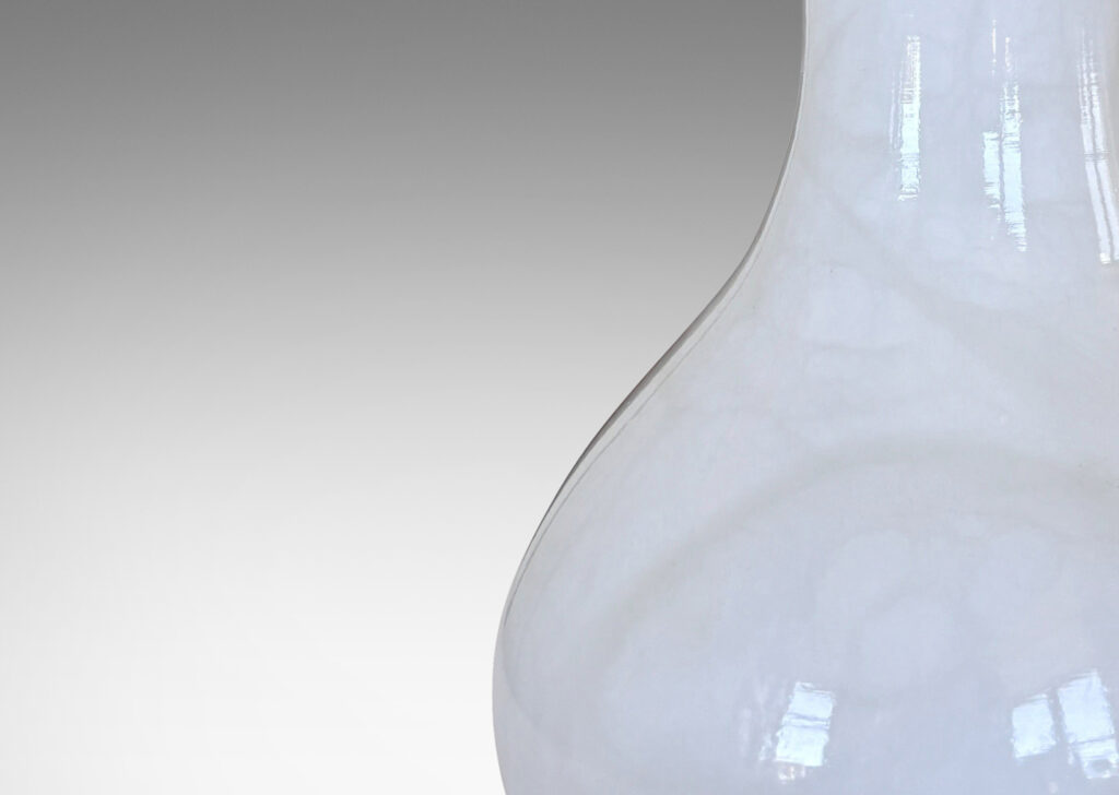 Gallery BAC vase-like forms in solid turned white marble with pale veining